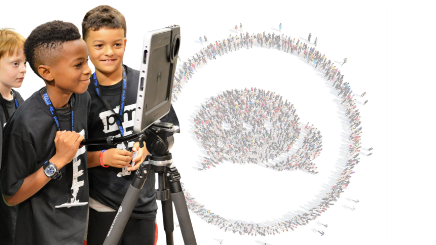 3 youth operate an iPad production kit with speech bubble in background of image