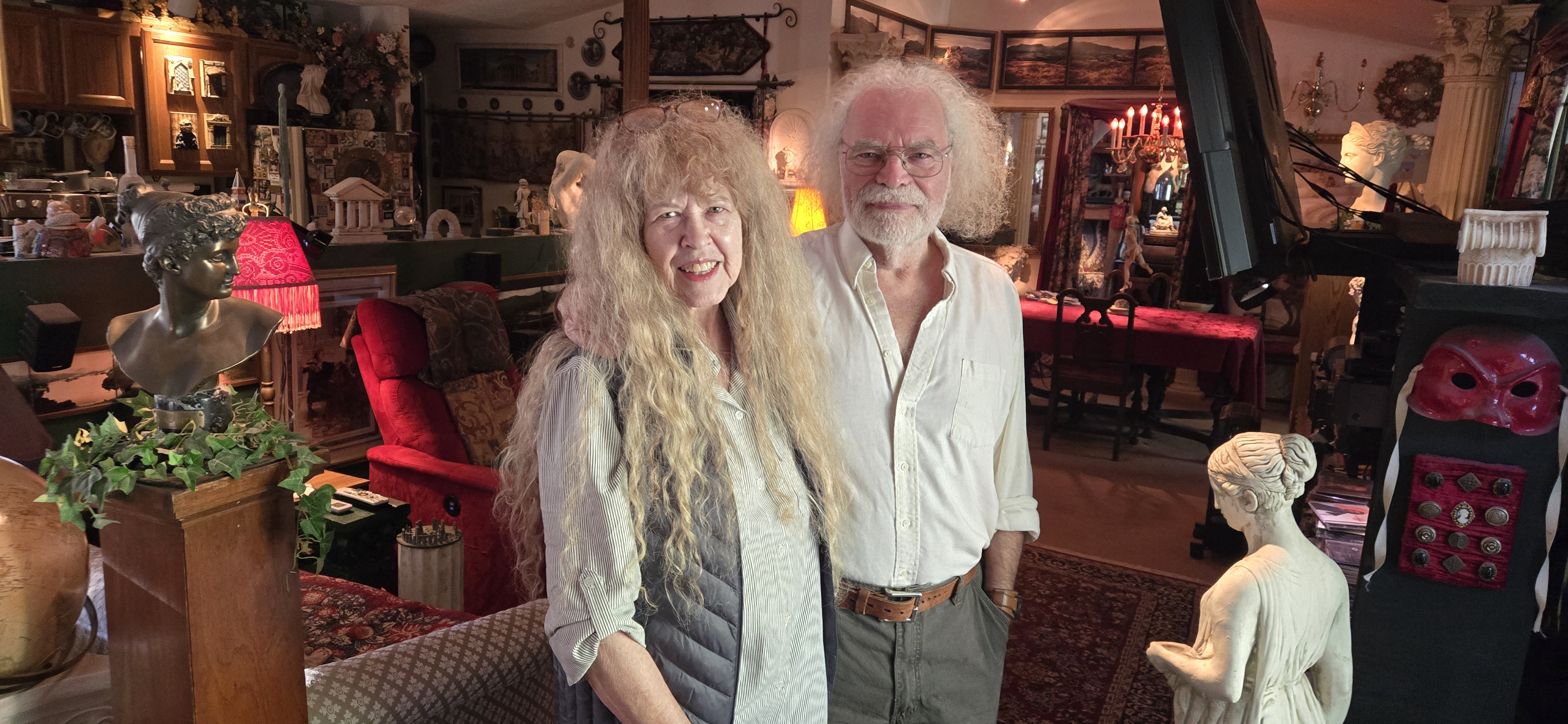 Chuck Bentley stands with his wife Donna in their home.