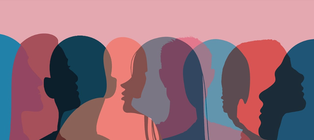 A graphic of many silhouettes of people's heads and profiles in multiple different colors, all partially transparent and overlapping.