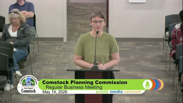 Presenter at podium at the comstock township planning commission meeting