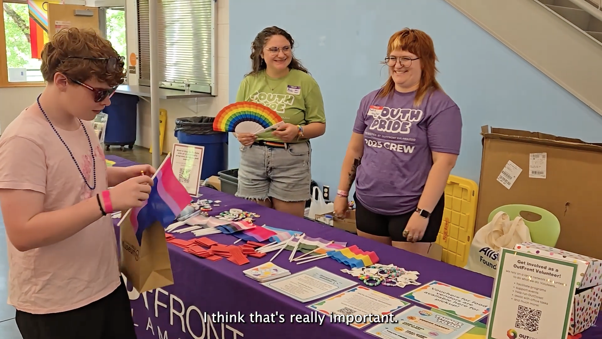 Outfront Kalamazoo team members tabling at an event.